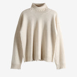 Tan knitwear, front view