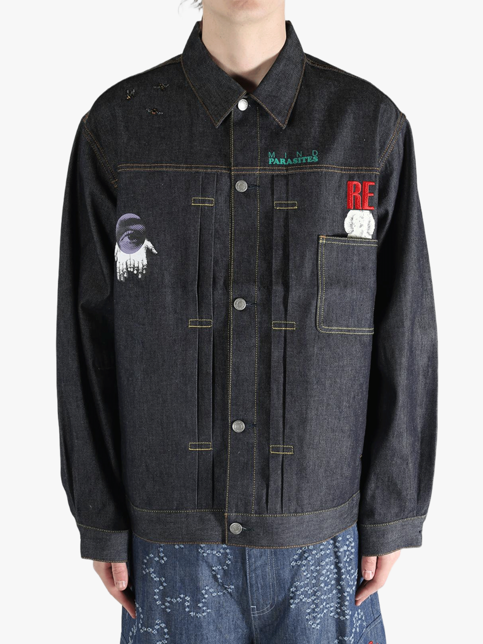 Blue jacket worn by a person, showing the  jacket fit