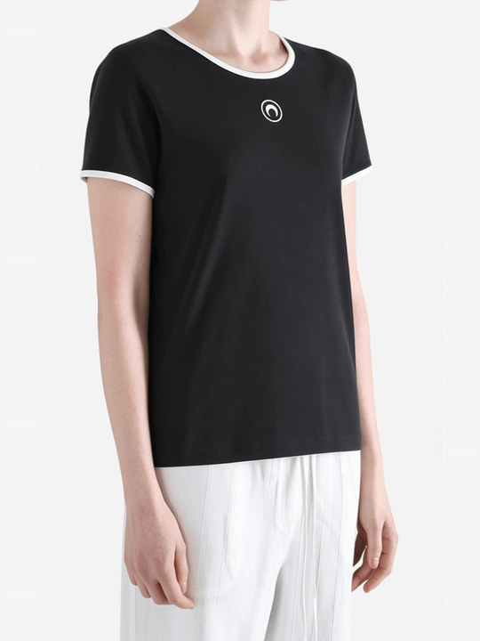 Black t-shirt worn by a person, showing the t-shirt fit