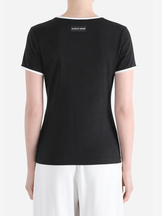 Black t-shirt worn by a person, showing the t-shirt fit