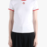 White t-shirts worn by a person, showing the t-shirts fit