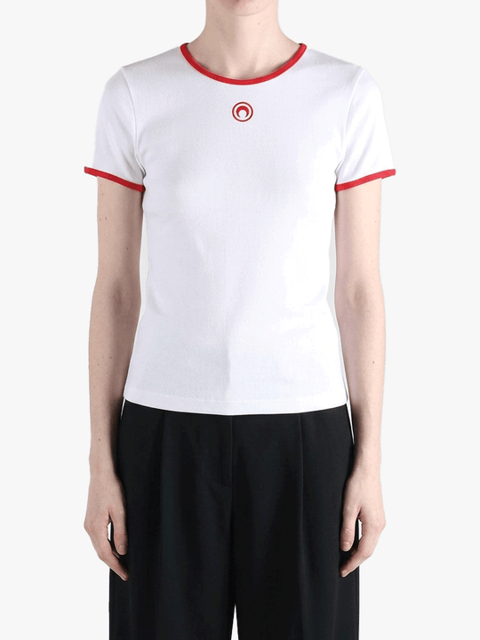 White t-shirts worn by a person, showing the t-shirts fit