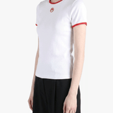 White t-shirts worn by a person, showing the t-shirts fit
