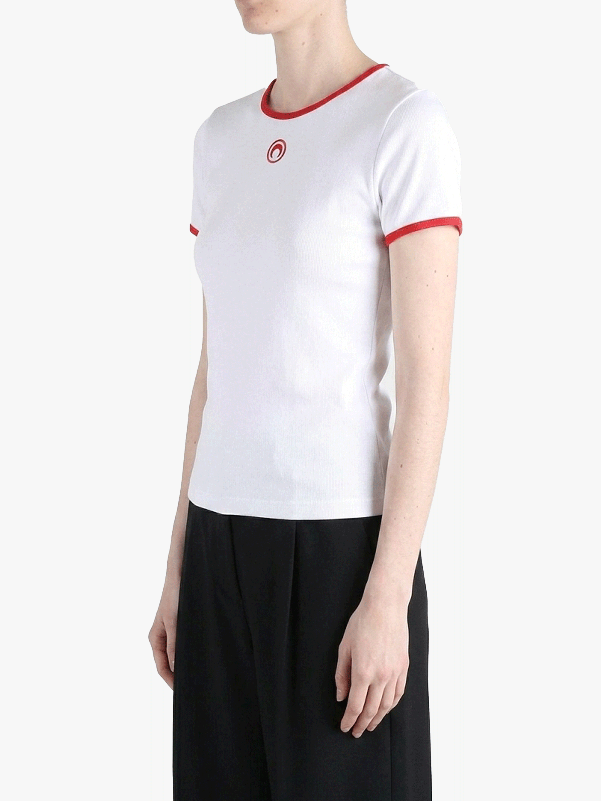 White t-shirts worn by a person, showing the t-shirts fit