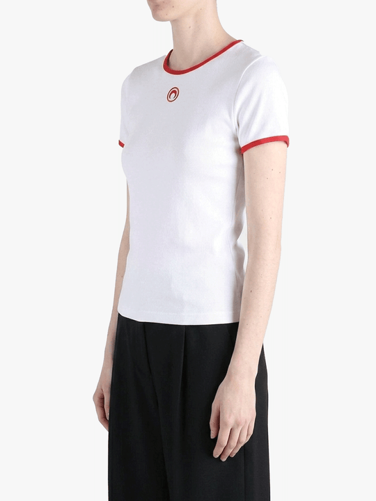 White t-shirts worn by a person, showing the t-shirts fit
