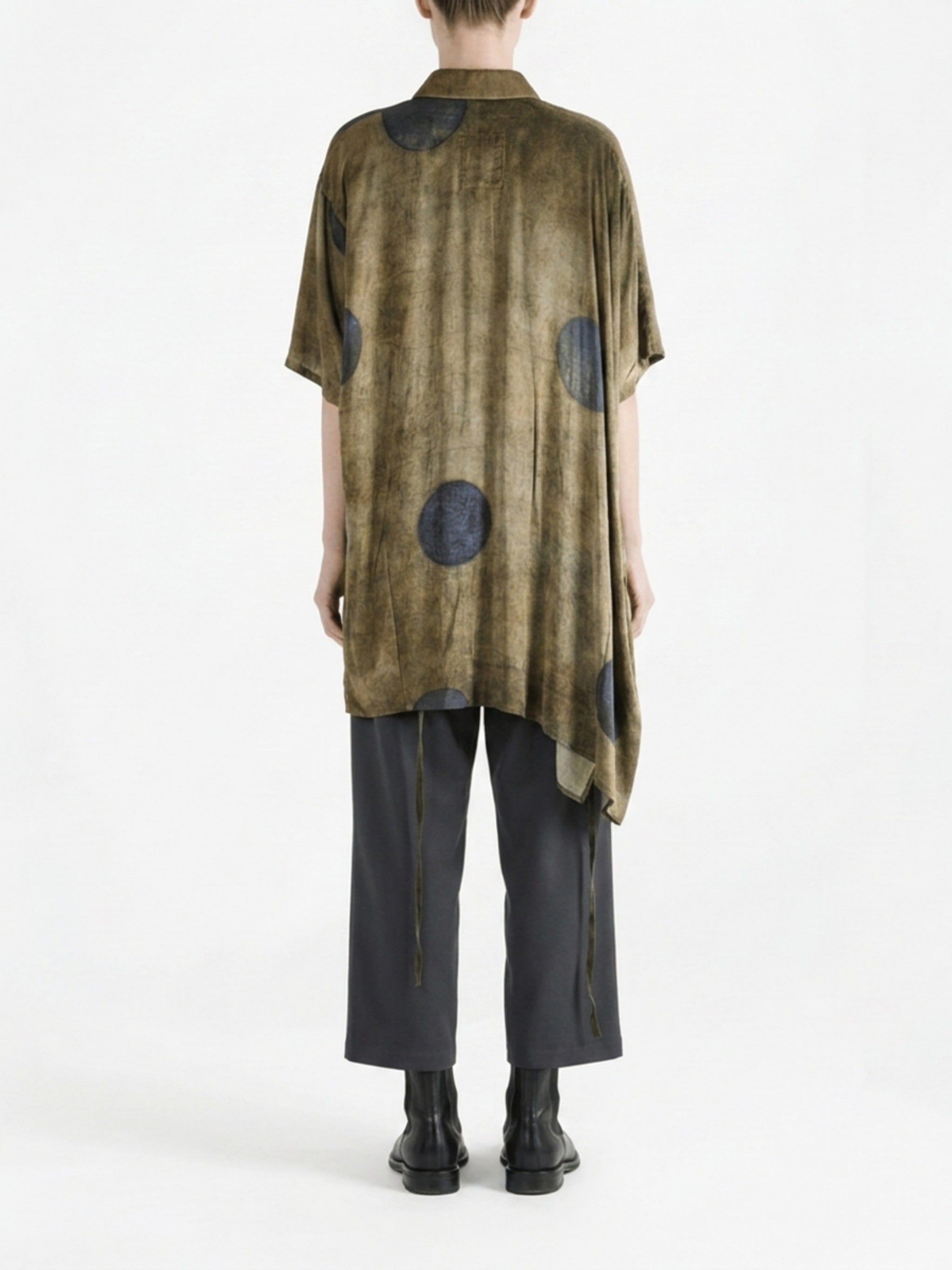 Brown top worn by a person, back view