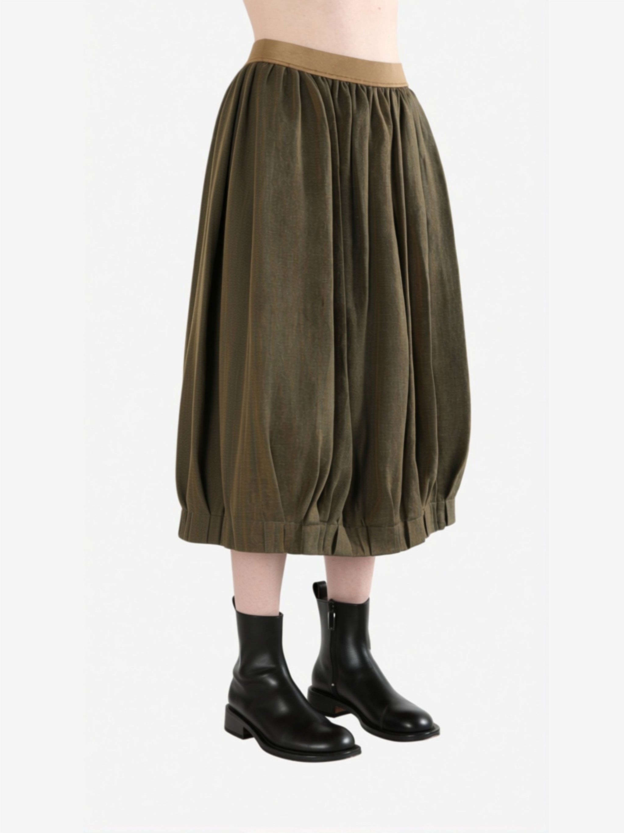 Brown skirt worn by a person, side view