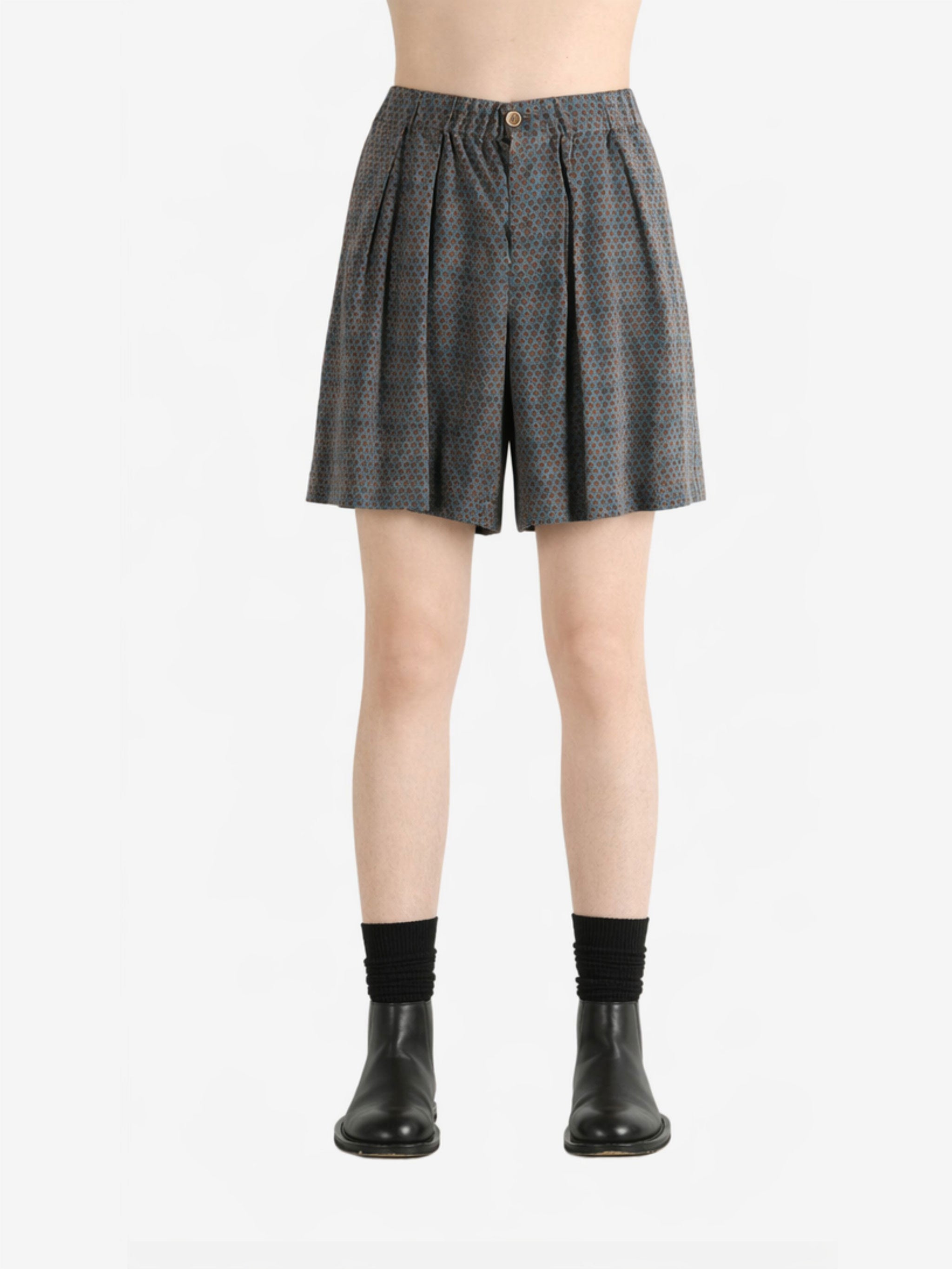 Blue pants worn by a person, showing the pants fit