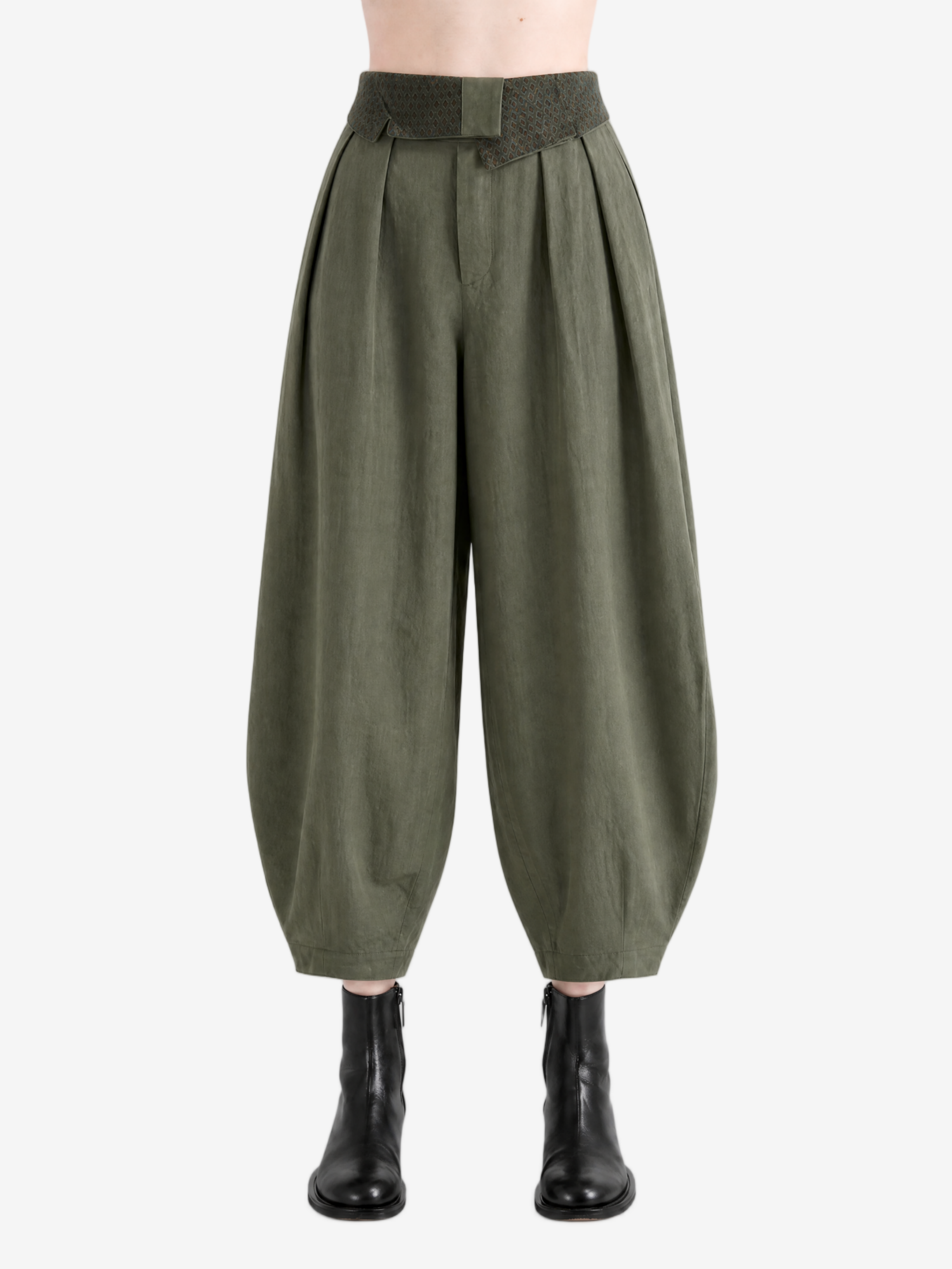 Green pant worn by a person, showing the pant's fit