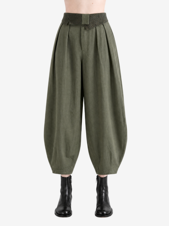 Green pant worn by a person, showing the pant's fit