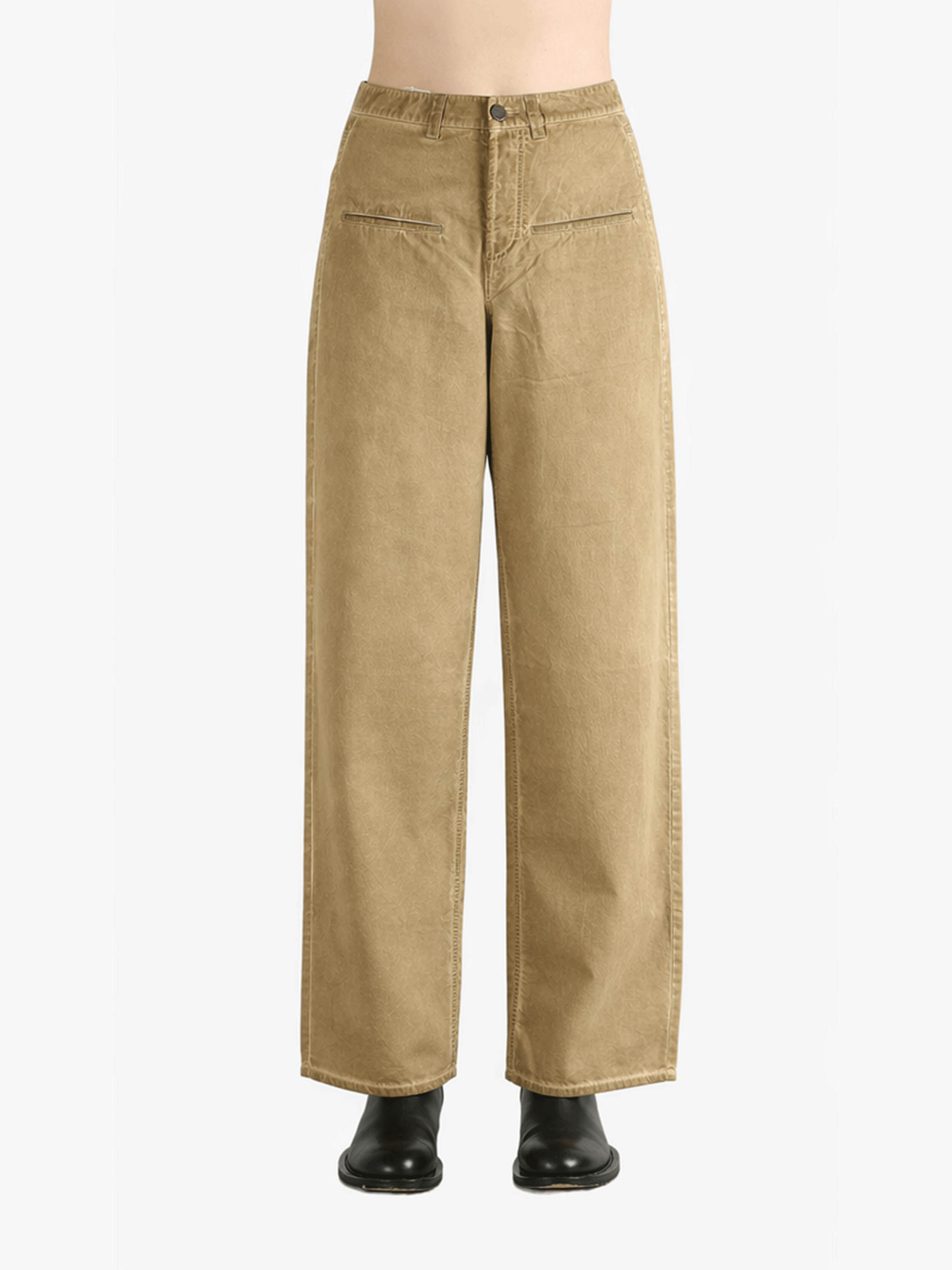 Tan pants worn by a person, showing the pants fit