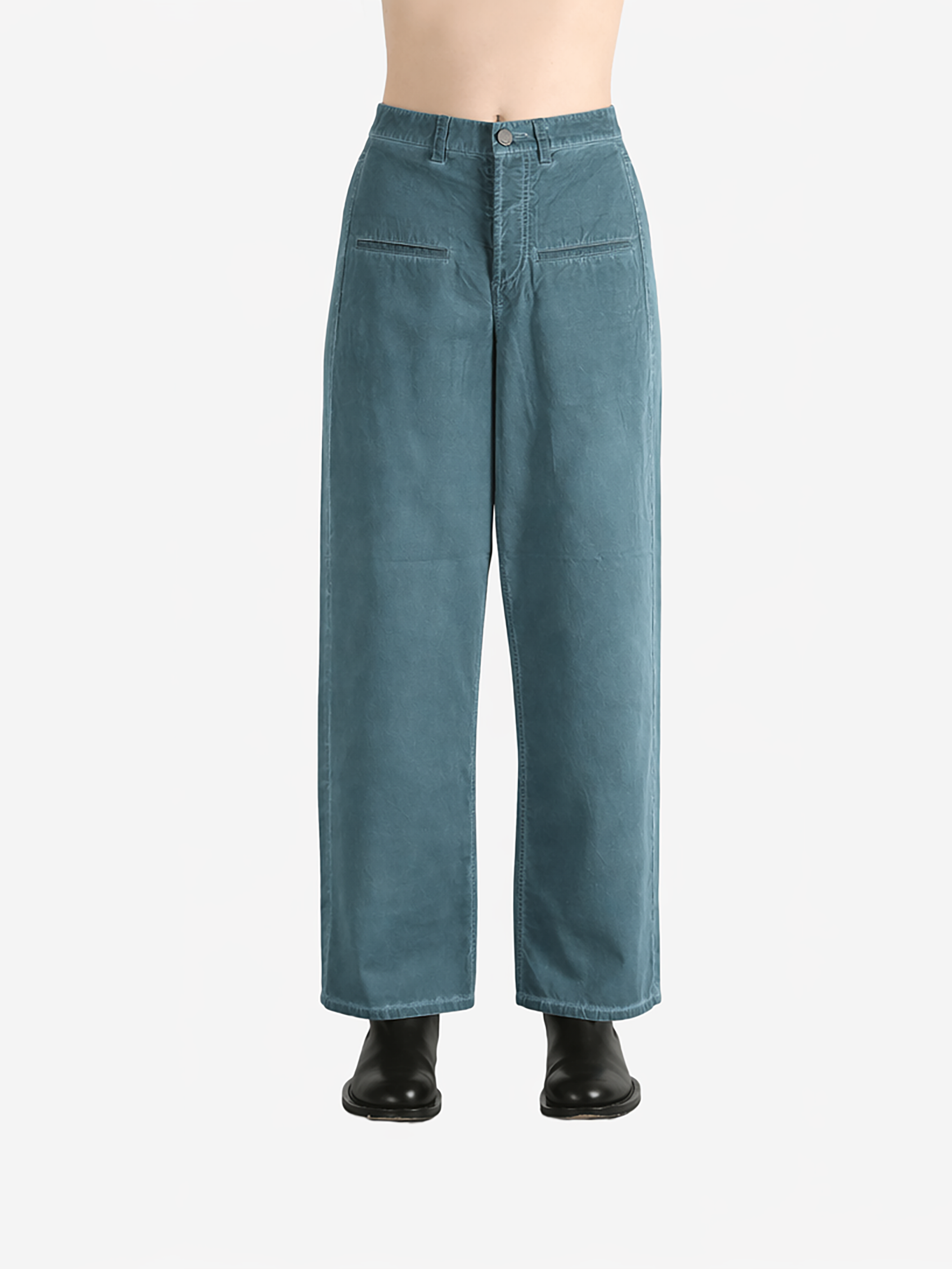 Blue pants worn by a person, showing the pants fit