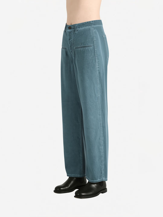 Blue pants worn by a person, showing the pants fit