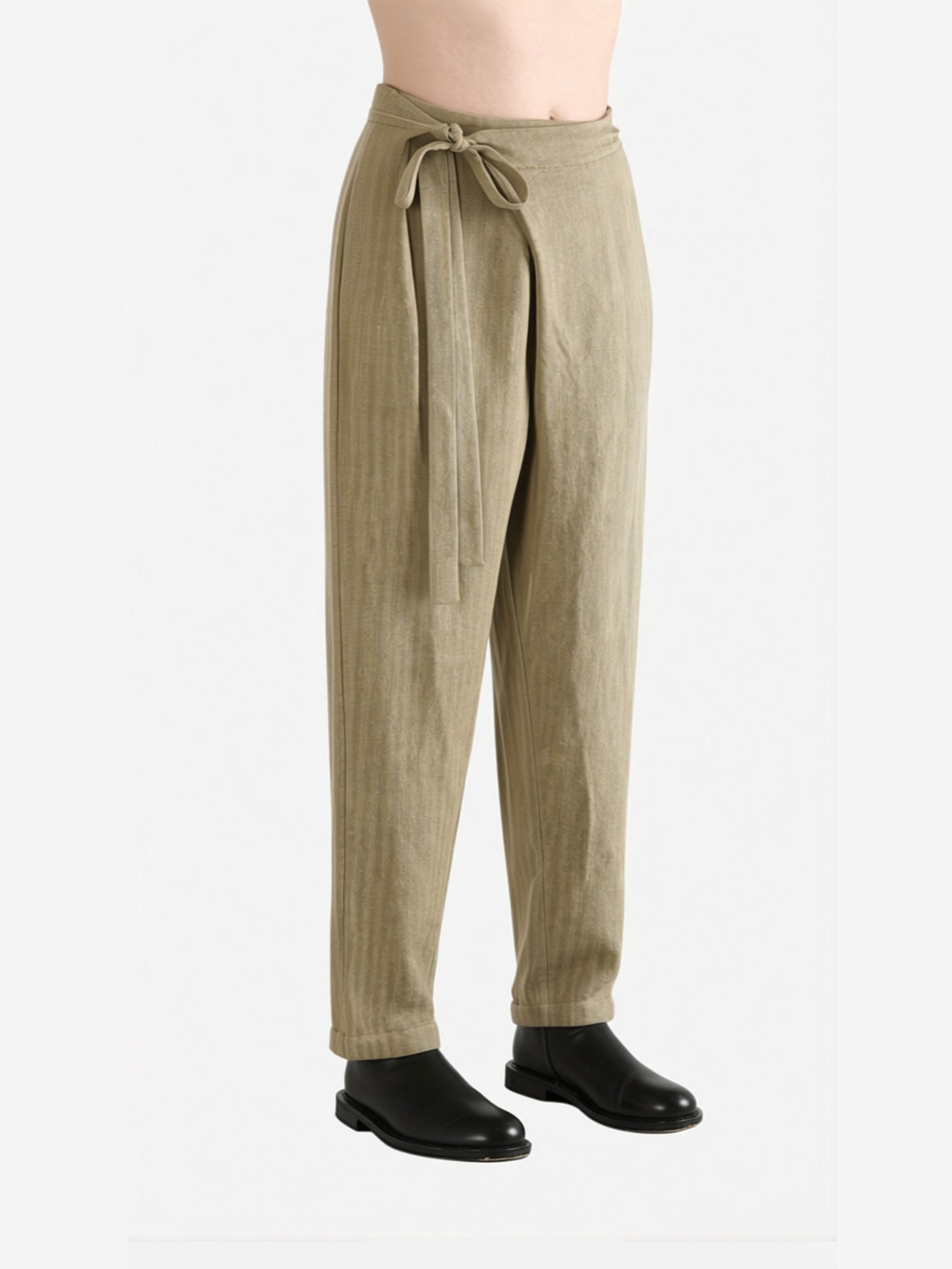 Tan pants worn by a person, side view