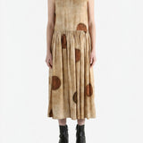 Brown dress worn by a person, showing the dress fit