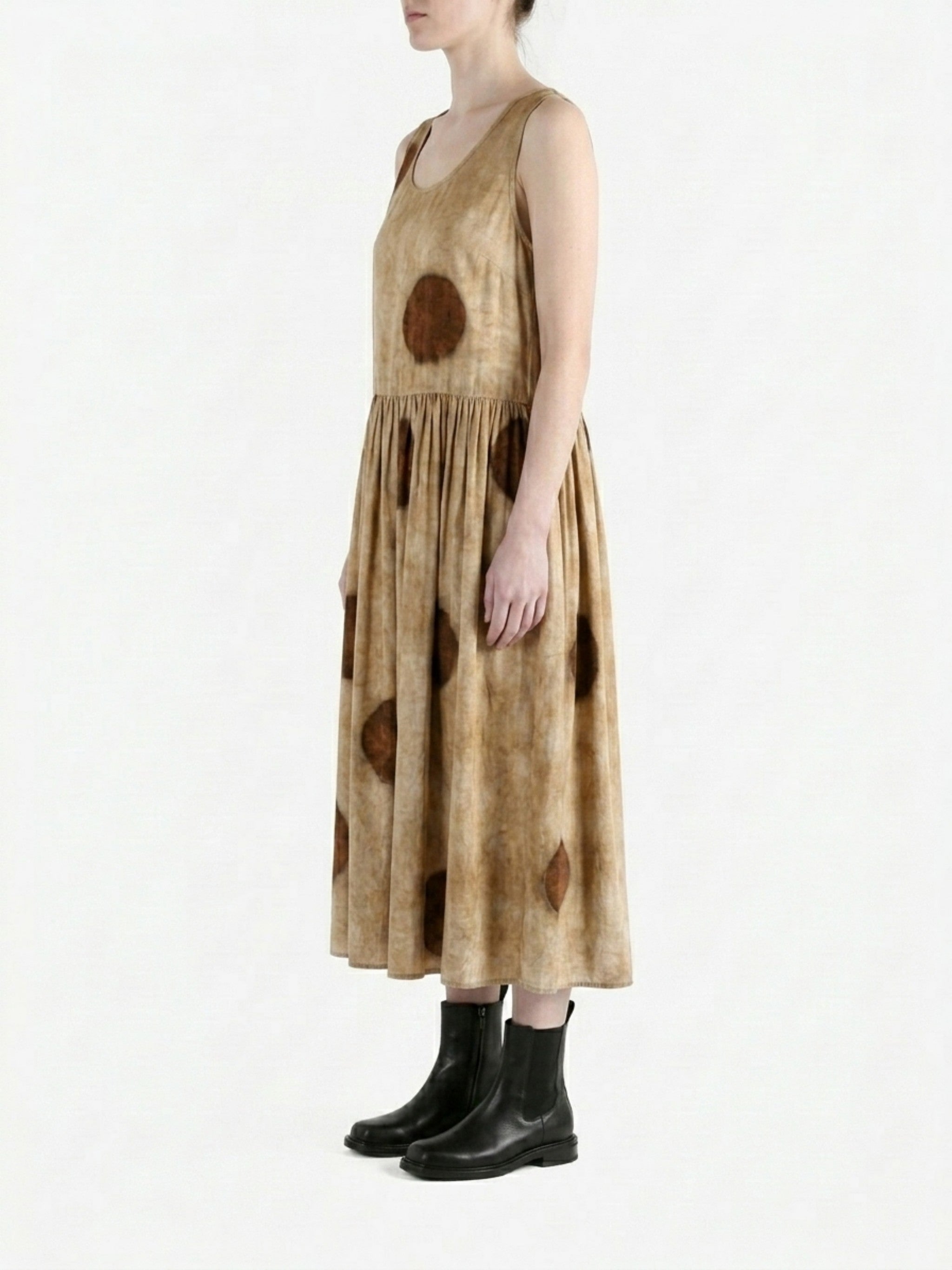 Brown dress worn by a person, side view