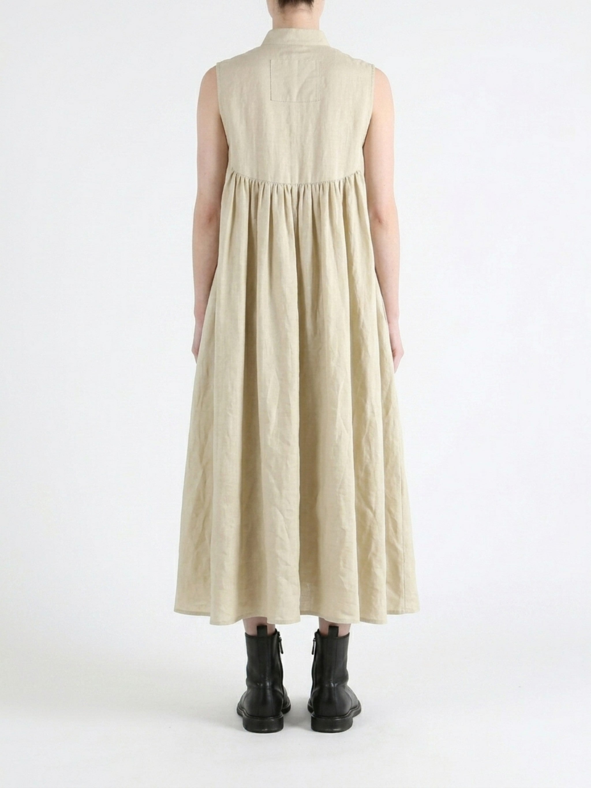 Tan dress worn by a person, back view
