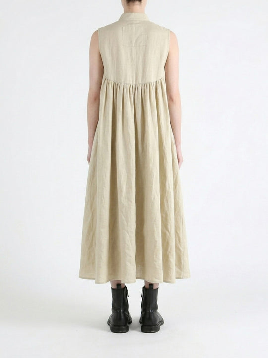 Tan dress worn by a person, back view