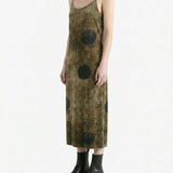 Brown dress worn by a person, side view