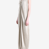 White dress worn by a person, side view