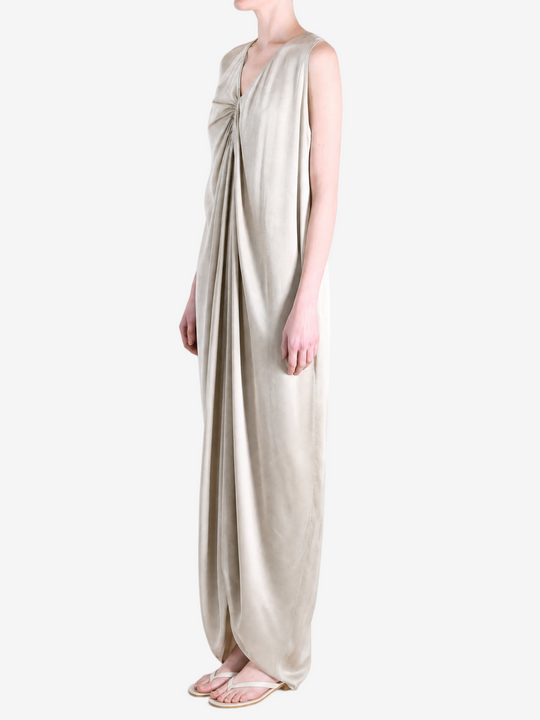 White dress worn by a person, side view