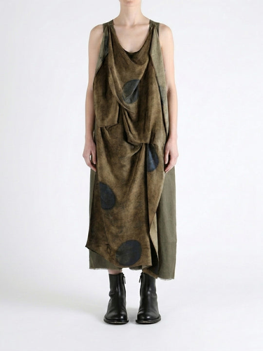 Green dress worn by a person, showing the dress fit
