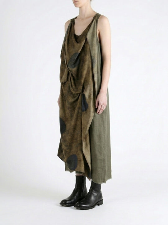 Green dress worn by a person, showing the dress fit