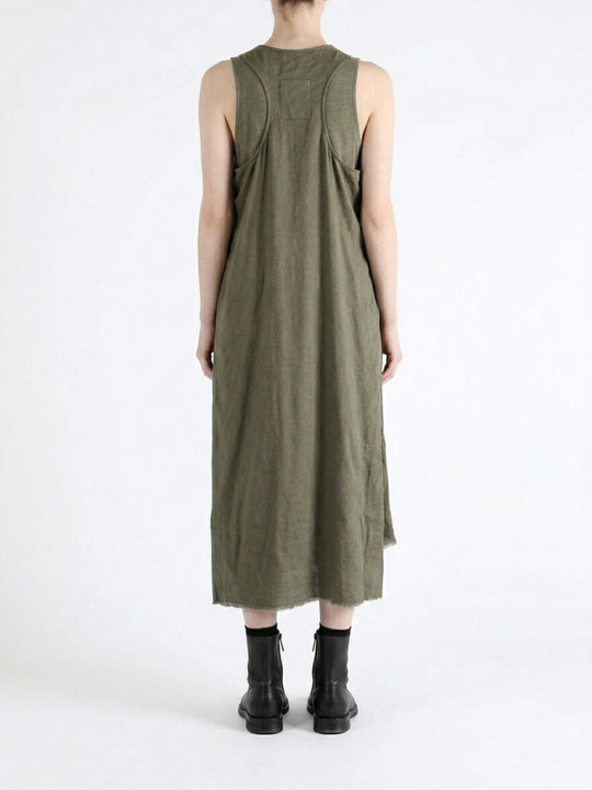 Green dress worn by a person, showing the dress fit