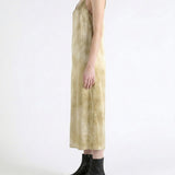 Tan dress worn by a person, showing the dress fit