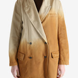 Brown jacket worn by a person, showing the jacket's fit