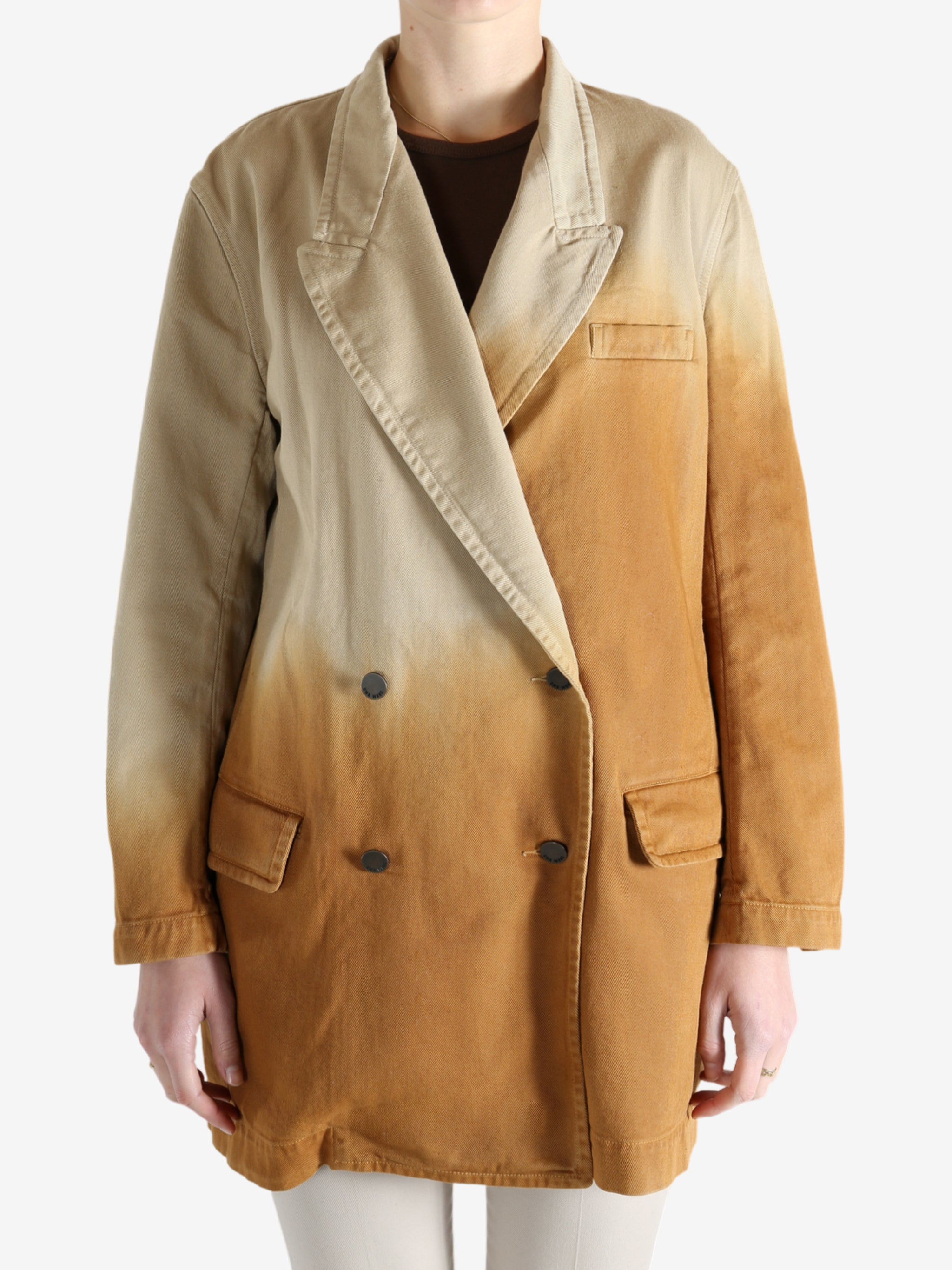 Brown jacket worn by a person, showing the jacket's fit