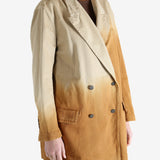 Brown jacket worn by a person, showing the jacket's fit