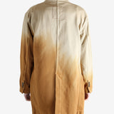 Brown jacket worn by a person, showing the jacket's fit