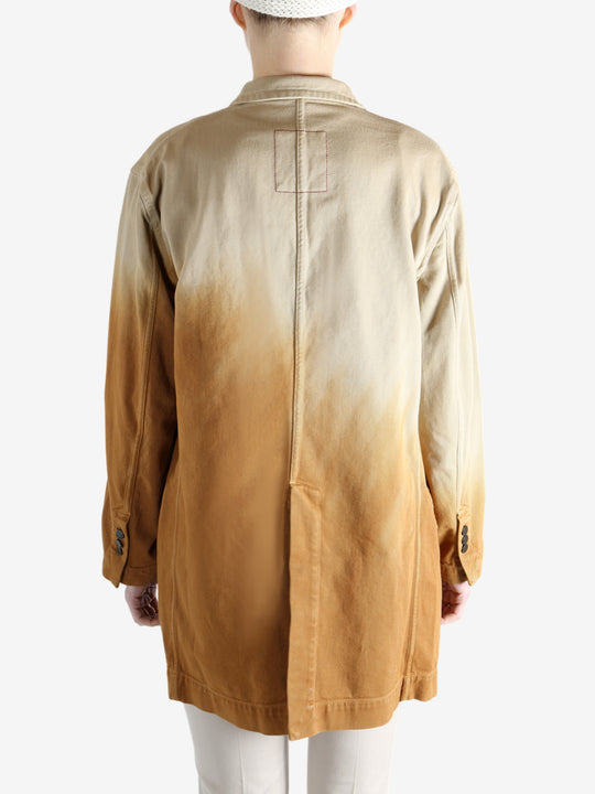 Brown jacket worn by a person, showing the jacket's fit