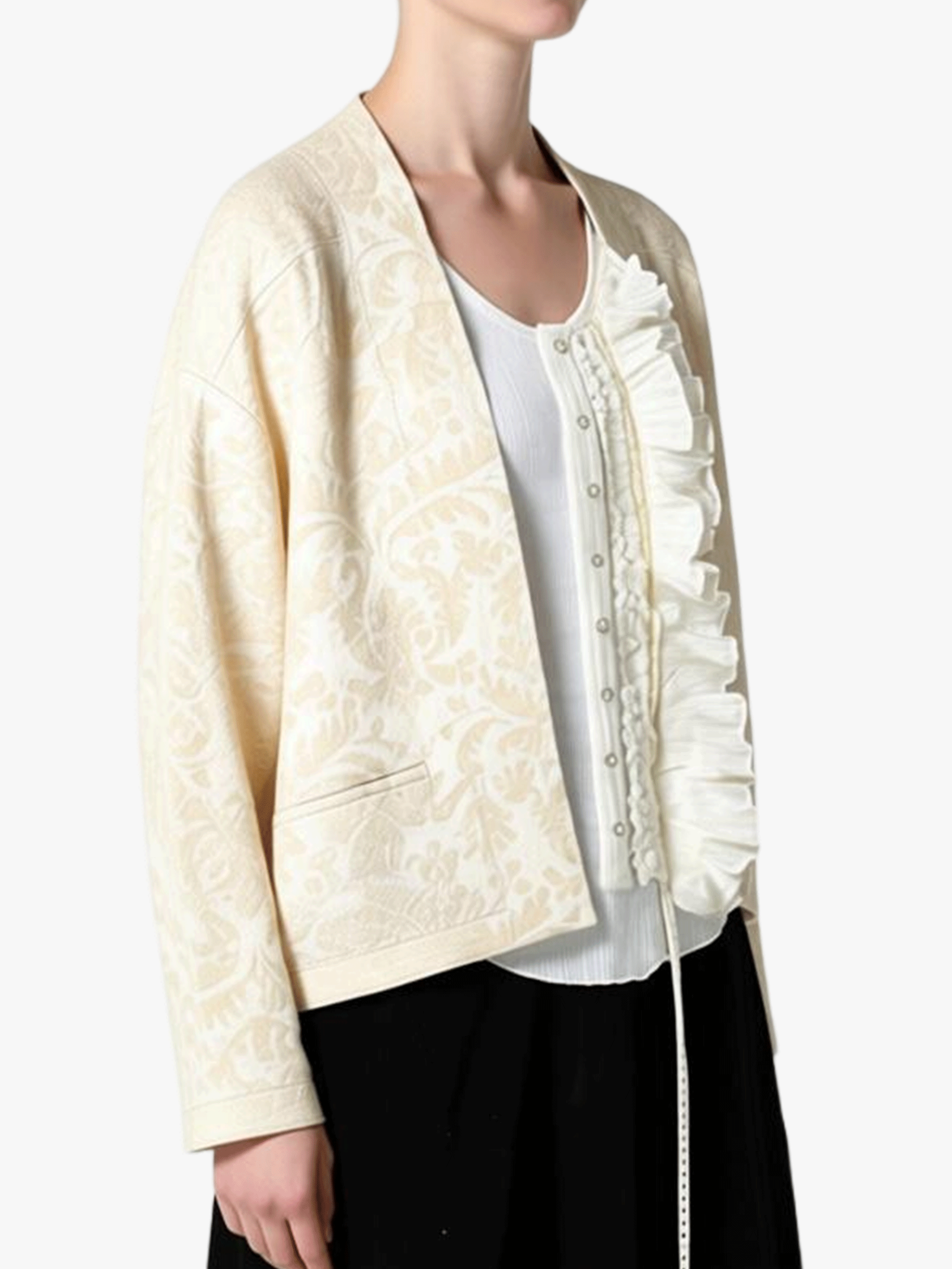 White jacket worn by a person, showing the jacket fit