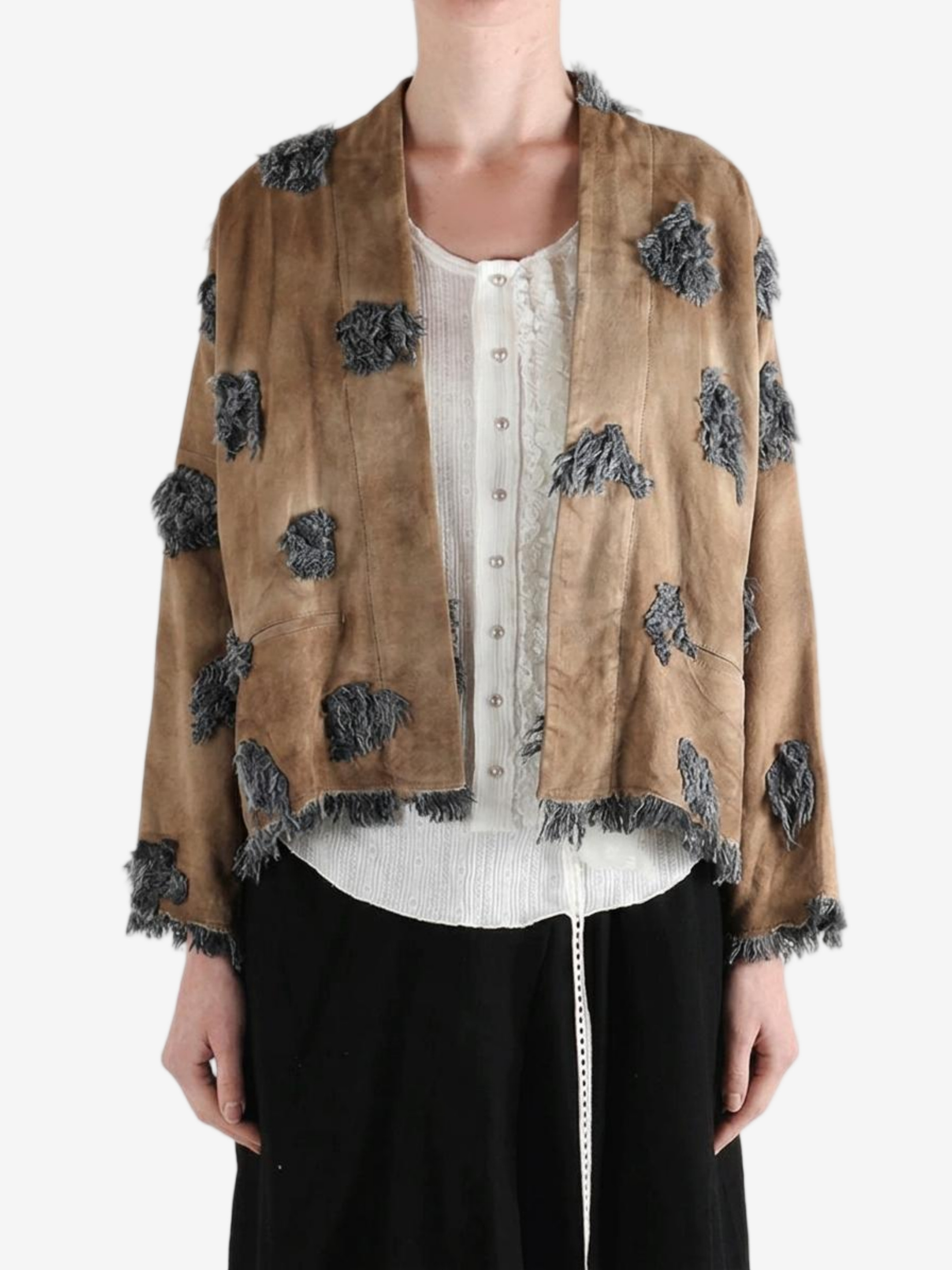 Brown jacket worn by a person, showing the jacket fit