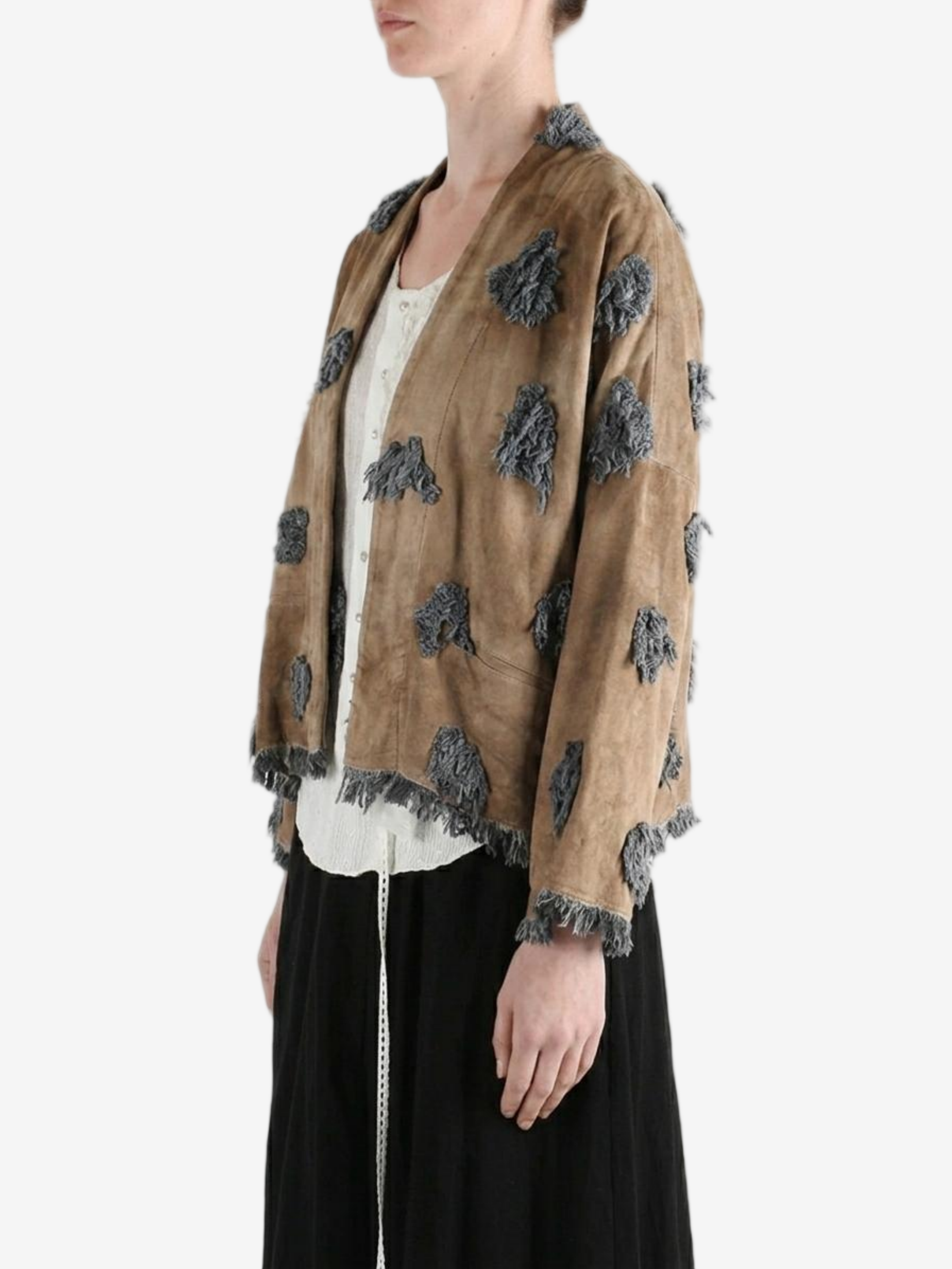 Brown jacket worn by a person, showing the jacket fit