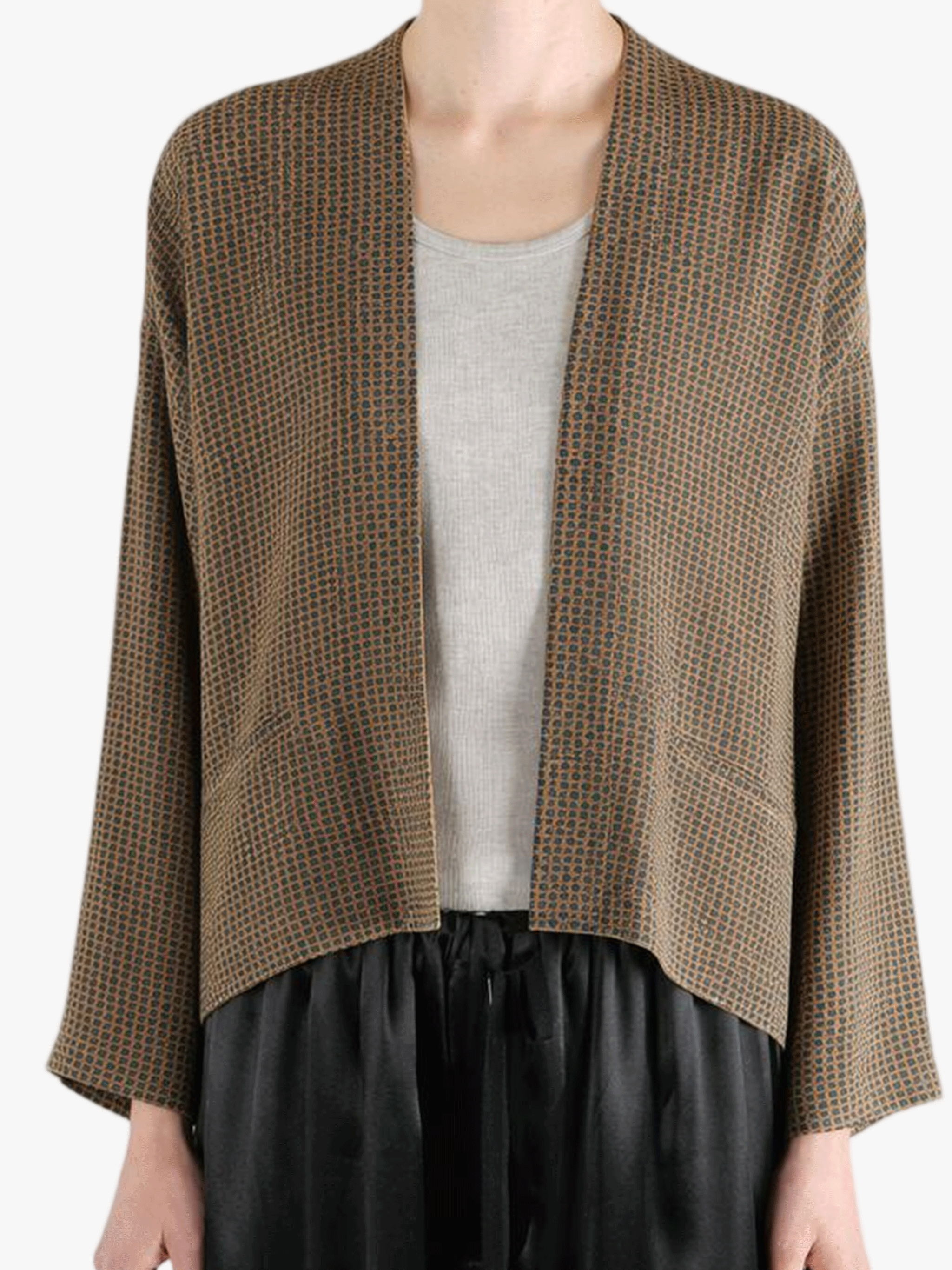 Brown jacket worn by a person, showing the jacket's fit