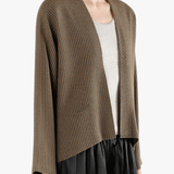 Brown jacket worn by a person, showing the jacket's fit