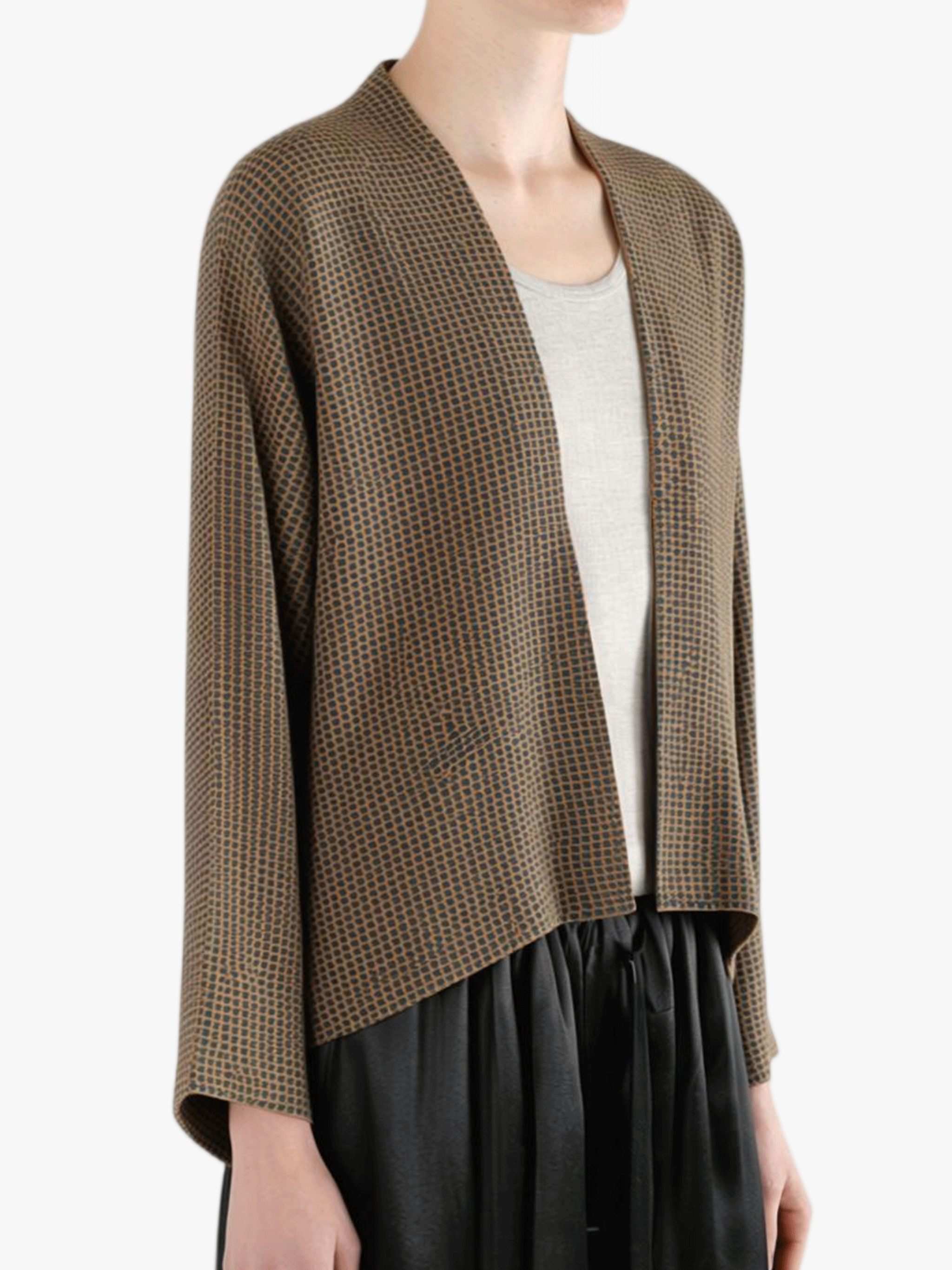Brown jacket worn by a person, showing the jacket's fit