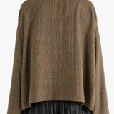 Brown jacket worn by a person, showing the jacket's fit