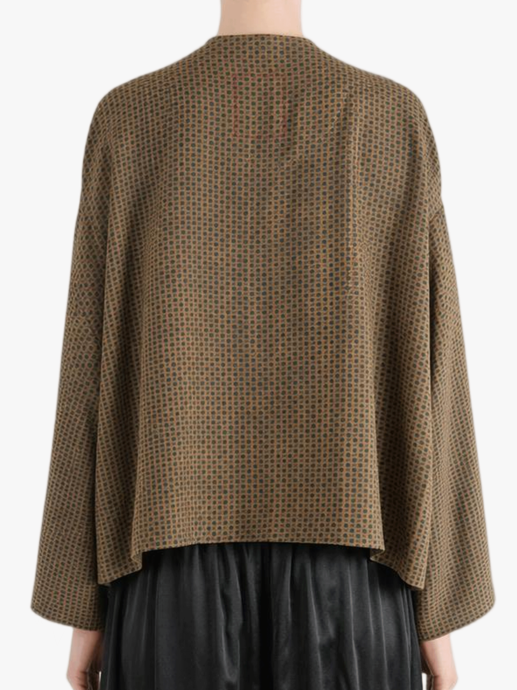 Brown jacket worn by a person, showing the jacket's fit