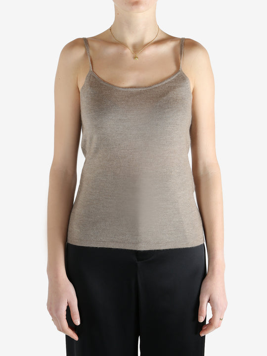 Tan knitwear worn by a person, showing the knitwear fit