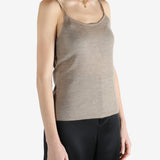 Tan knitwear worn by a person, showing the knitwear fit