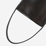 Close up of black bag, showing texture of the calf leather fabric