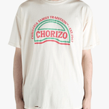 White t-shirt worn by a person, showing the shirt's fit