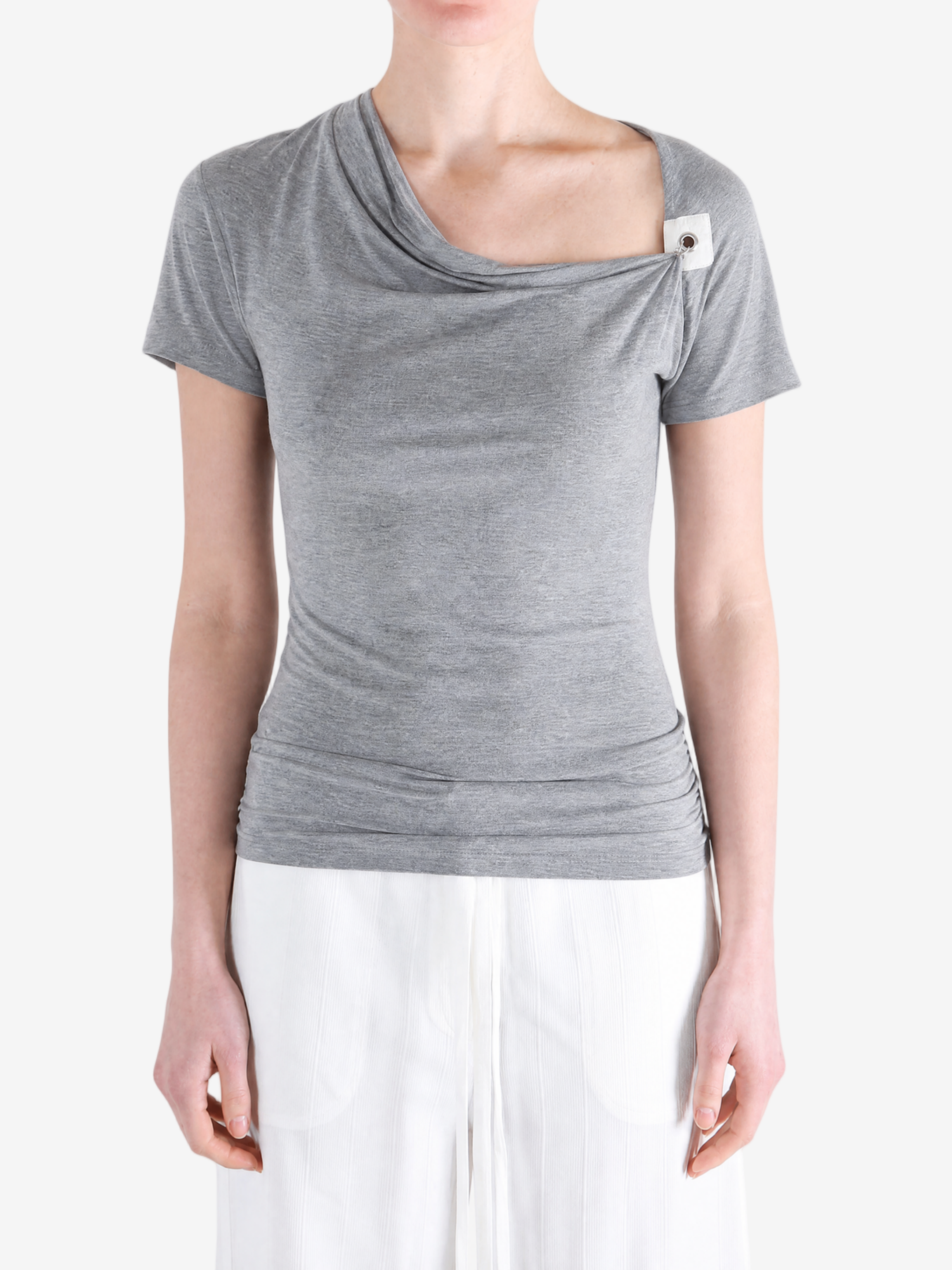 Grey top worn by a person, showing the top fit