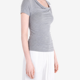 Grey top worn by a person, showing the top fit