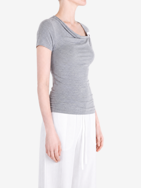 Grey top worn by a person, showing the top fit