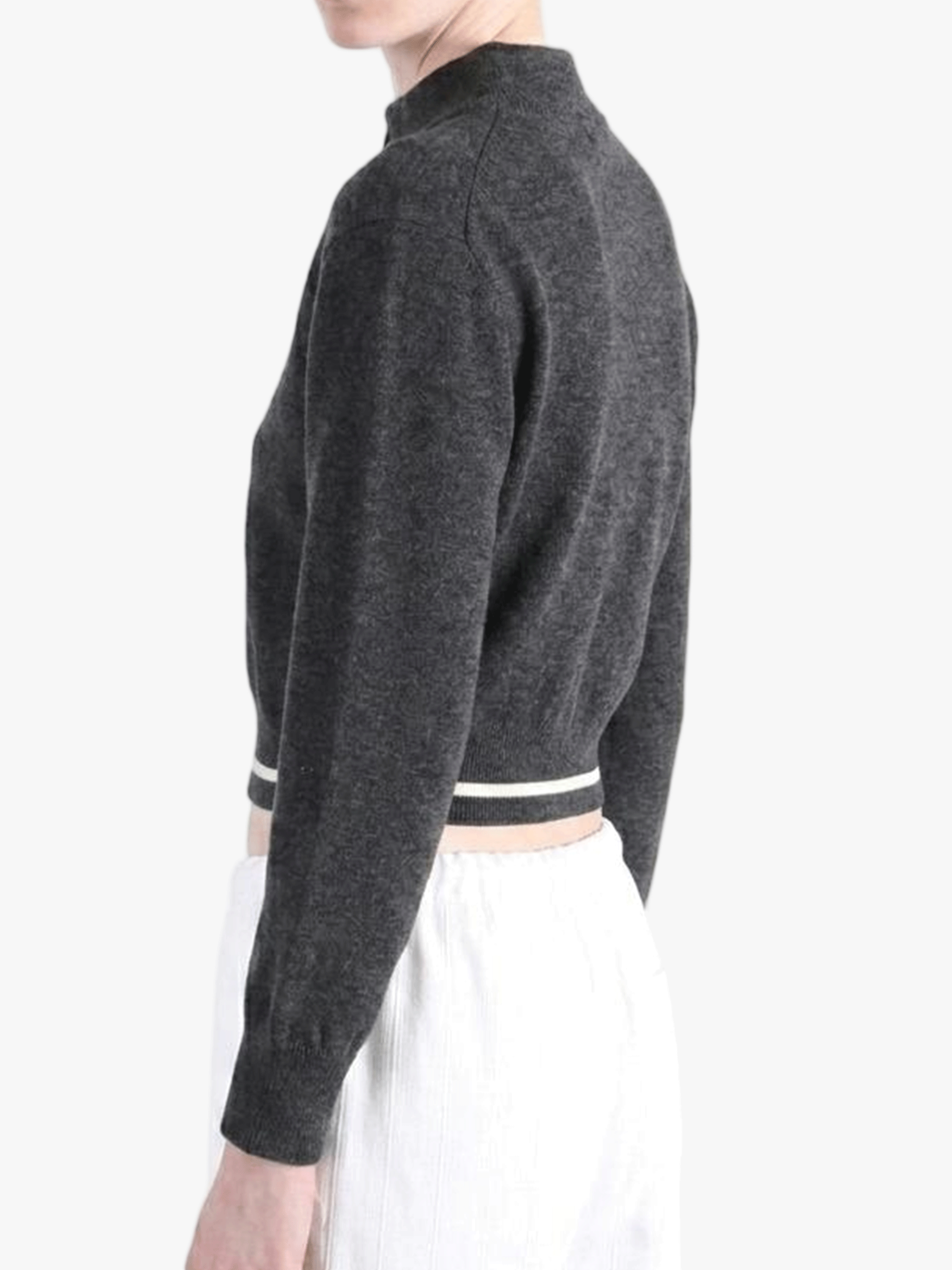 Black knitwear worn by a person, side view